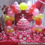 Red, Pink, Yellow Balloon Cake Arch for Minnie Mouse