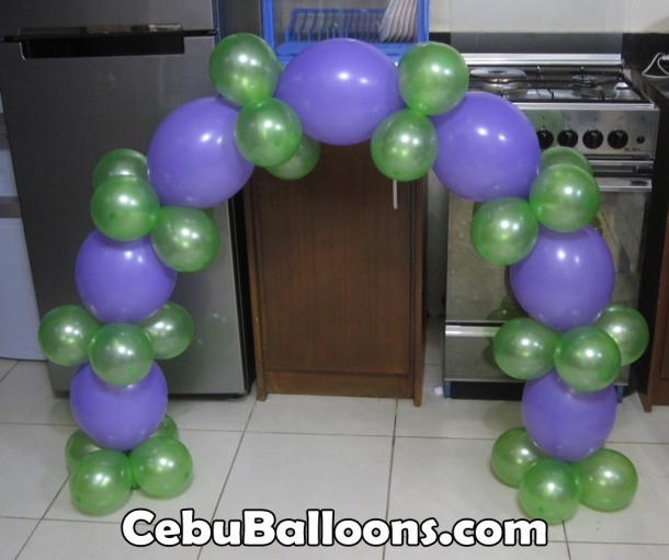 Simple Barney Theme Cake Arch