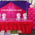 Baby Girl with Pacifier Balloon Decor at Metro Park Hotel Poolside